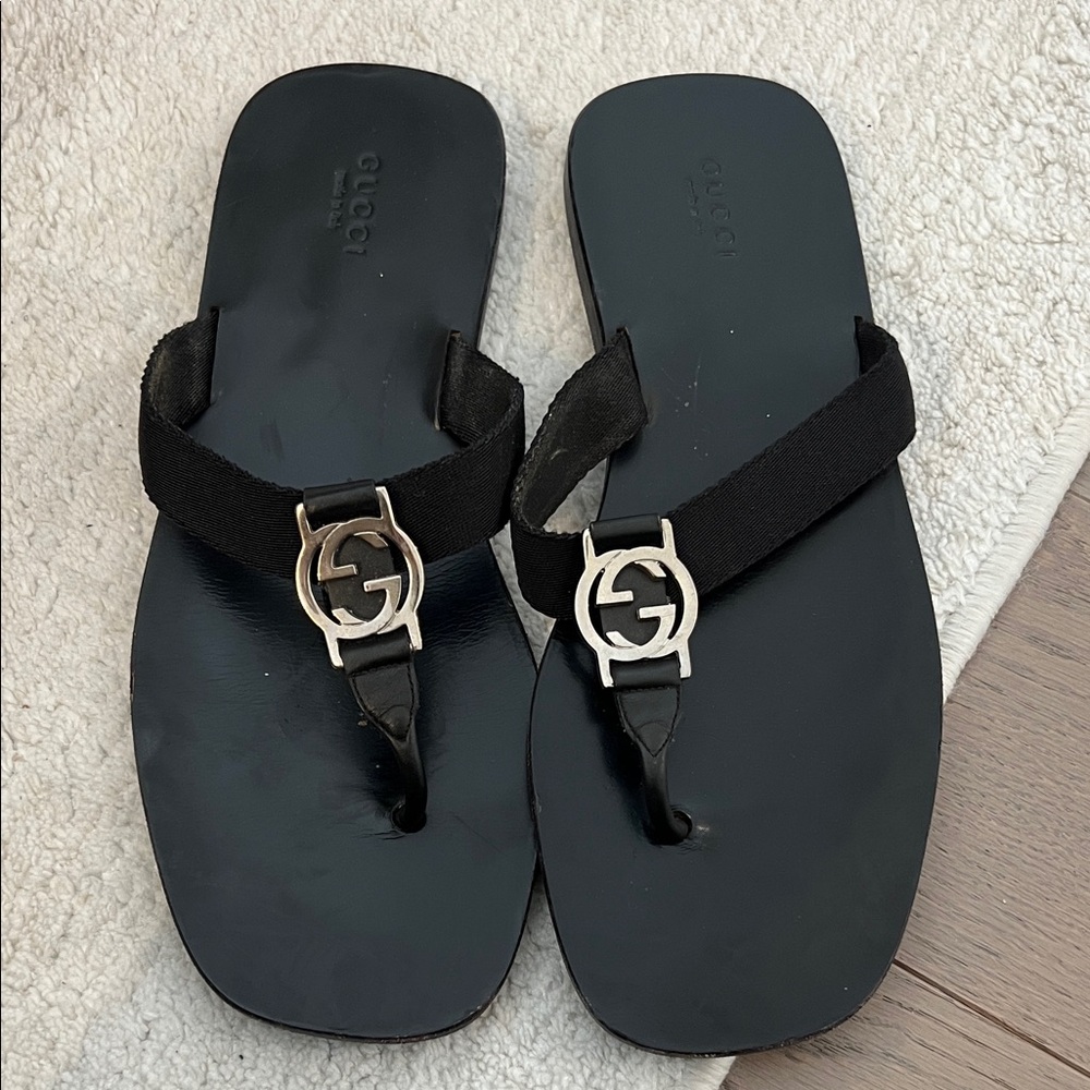 Gucci Black Flip Flops with Silver Emblem